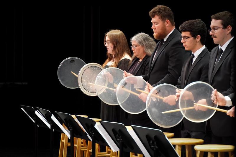 A group of performing arts students performing together